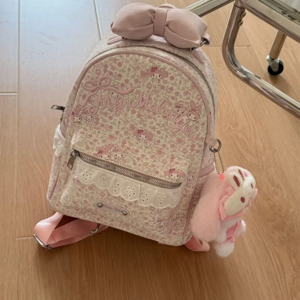 Милый розовый мини-рюкзак My Melody с цветочным принтом по всей поверхности, повседневный городской рюкзак с мультяшным бантом и плюшевым брелоком, маленькая школьная сумка