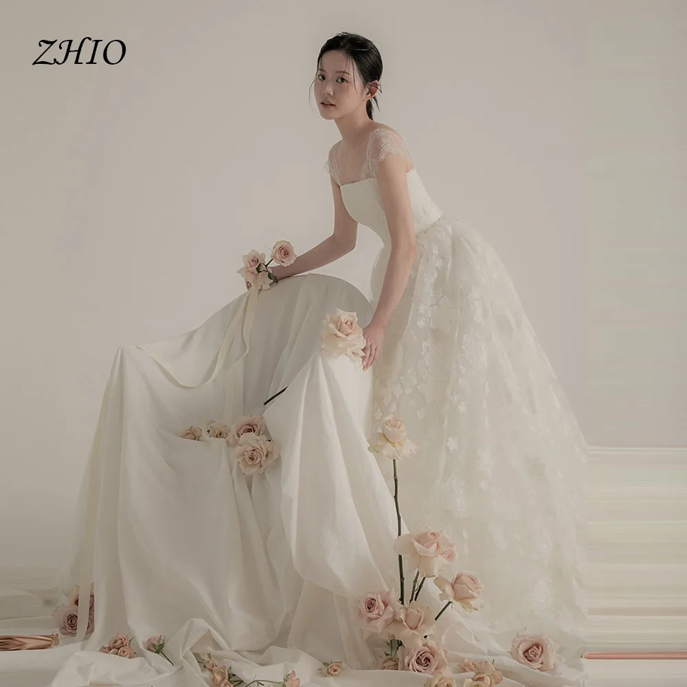 ZHIO Abito bianco a trapezio Matrimonio coreano Pizzo Tulle Senza spalline Corsetto personalizzato Lunghezza pavimento Matrimonio Snap Festa di lusso nne Anelli