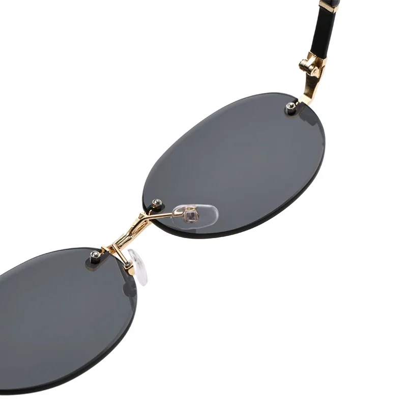 Personalized Oval Frame Sunglasses Retro Women Men Metal High-end Sunglasses Luxuy Frameless Trimming Traveling UV400 Sunglasses