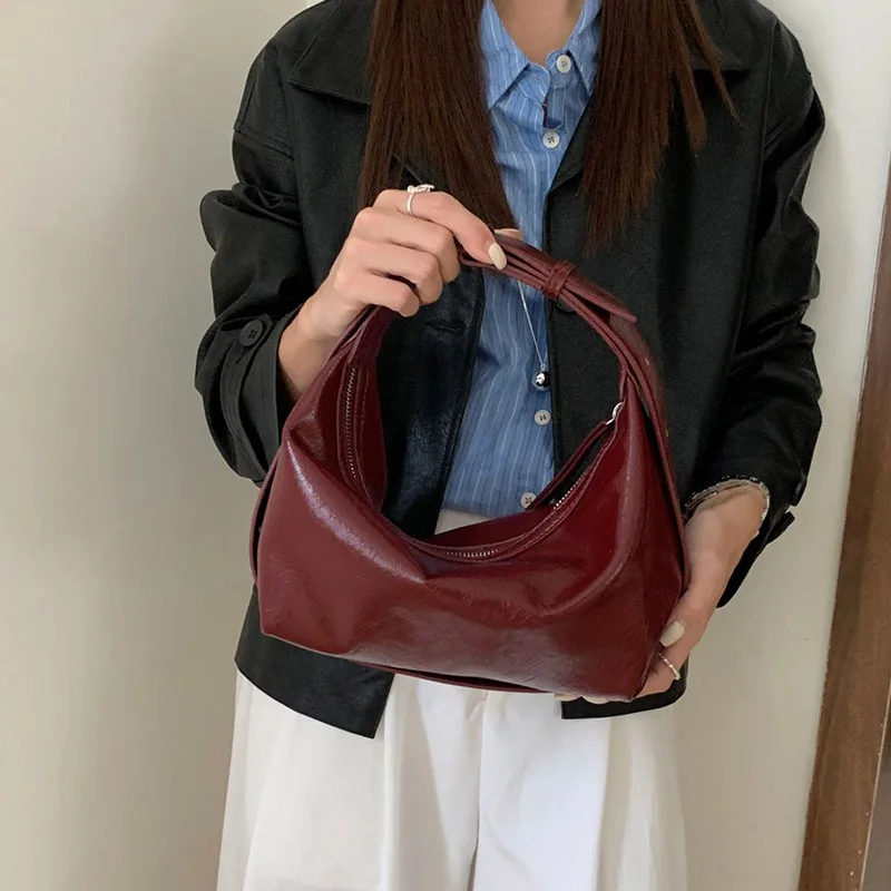

2025 new fashion PU leather dumpling bag vintage minimalist casual handheld crescent multifunction cloud bag portable shoulder b