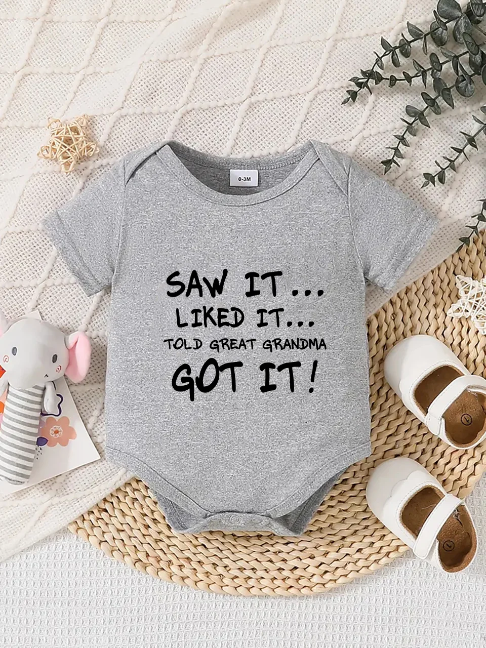 

Playful letter-printed baby short-sleeve triangle bodysuit. Button closure for easy dressing, machine washable