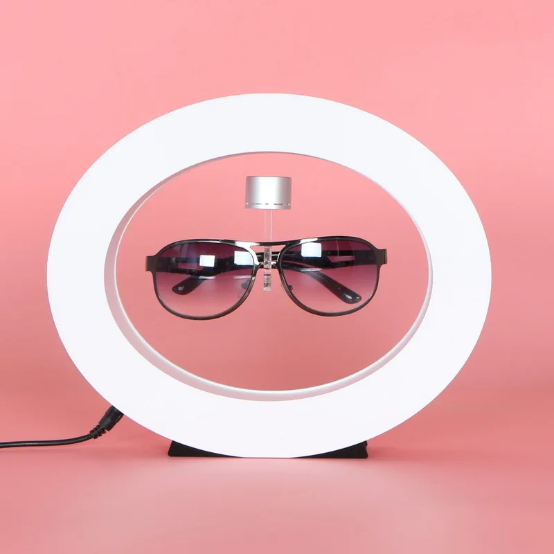 Magnetic Levitation Glasses Display Rack, Oval Shaped, White Glowing, Self Rotating Glasses Store, Creative Advertisement