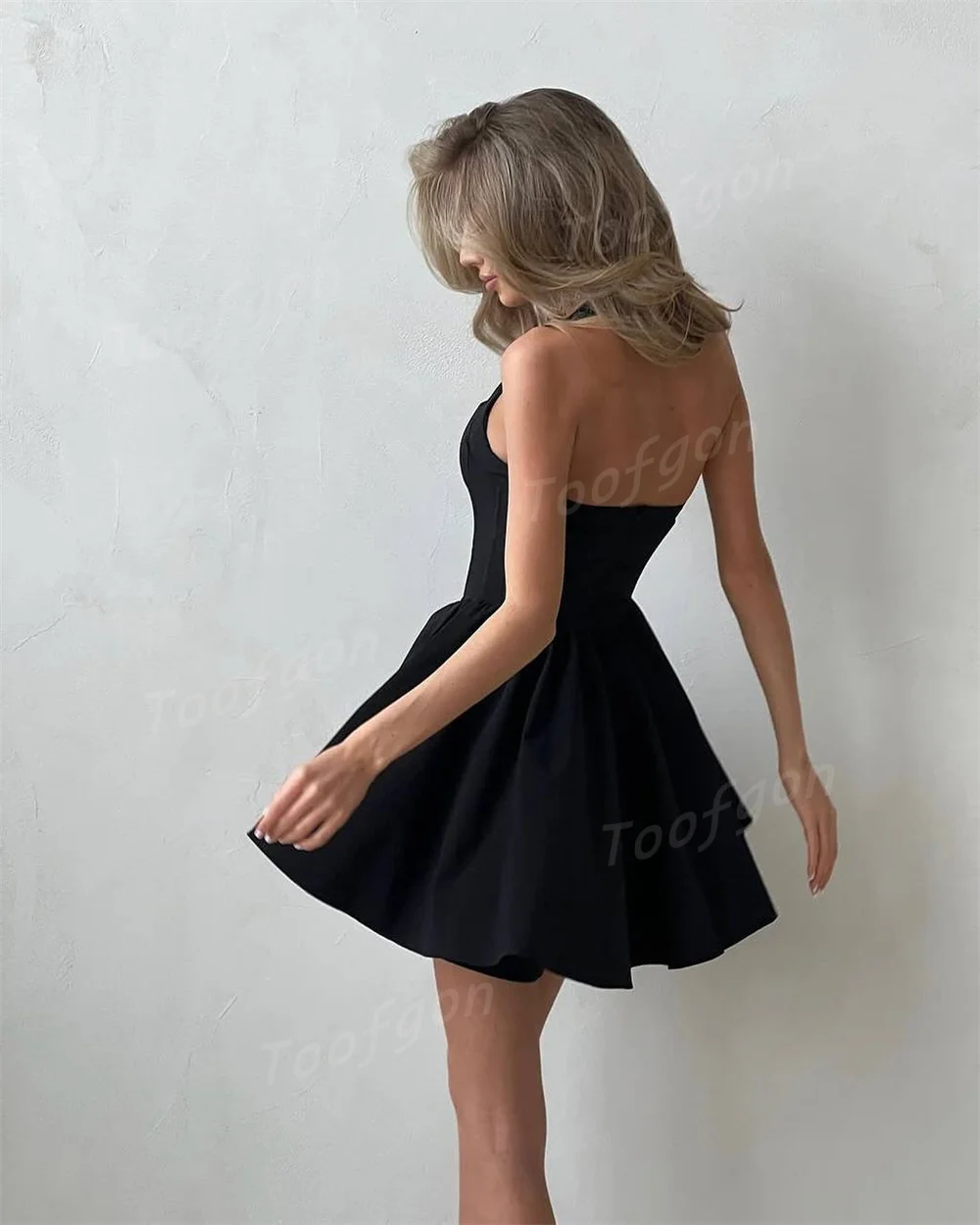 فساتين سهرة قصيرة سوداء من Toofgon رسن مخصصة من الساتان على شكل حرف A بدون أكمام للحفلات الراقصة للنساء فوق الركبة فستان رسمي للحفلات
