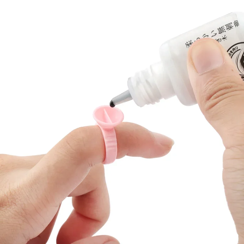 Zestaw do przedłużania rzęs: aplikator do tuszu, szczoteczka do rzęs, kryształowe waciki, pierścienie na klej, taśma, podkładki pod oczy, narzędzia do makijażu rzęs.