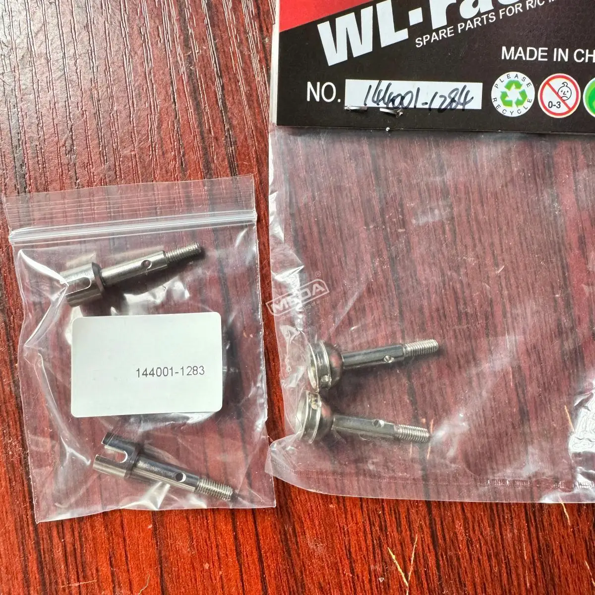 Wltoys144001 RC Car Spare Parts 1283 Front Wheel Cup 1284 Rear Wheel Cup 144001 Front/Rear Axle Cup Group ﻿