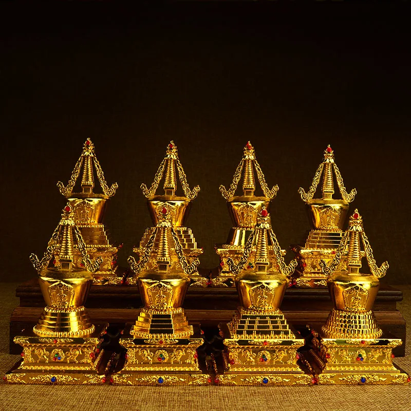 A set of 8 copper alloy Tibetan including the Eight Pagodas of Tathagata Bodhi Pagoda Buddha Pagoda and Saritaka