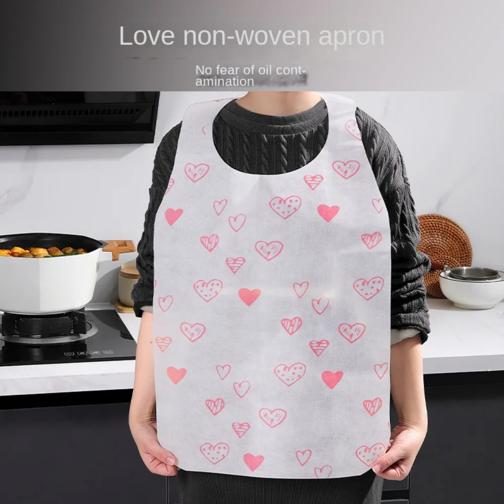 10Pcs/Bag Heart Printed Disposable Aprons Oil-proof Non Woven Cooking Apron Anti-fouling Hotel Restaurant Barbecue Apron