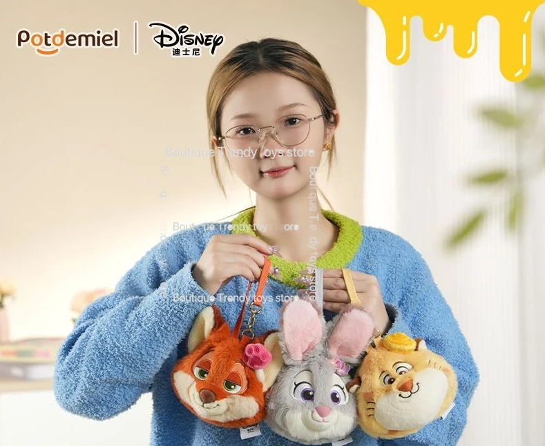 Disney Zootopia Judy Nick leopardo oficial cartera auricular portátil Mini llavero lindo dibujos animados monedero de felpa colgante Decoración