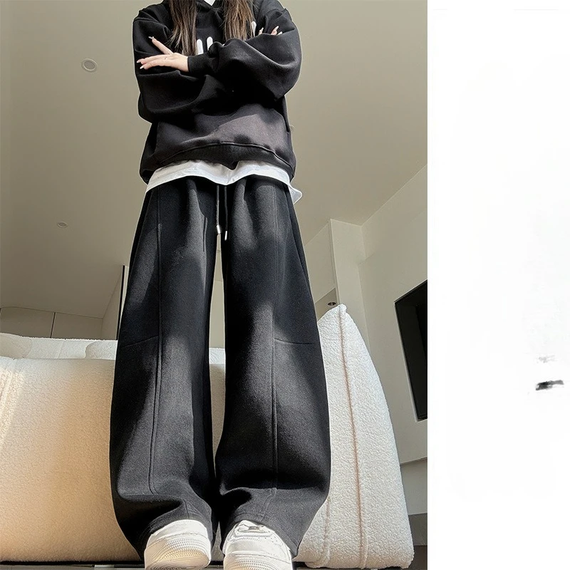 ネイビーブルーの女性用バナナスウェットパンツ、スリムストレートワイドレッグパンツ、ゆったりシミターデザイン、春と秋に最適