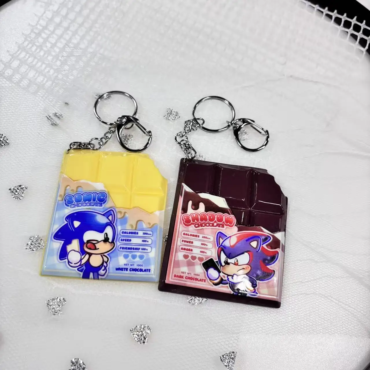 Lindos llaveros de chocolate con erizo y sombra: adorables diseños en forma de barra de chocolate con erizo y sombra.