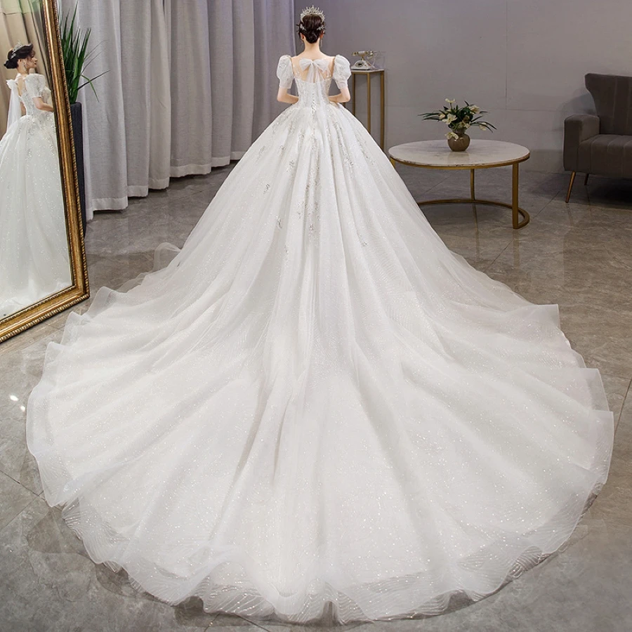 2024 new summer bride square collar backless sequined lantern sleeves temperament trailing wedding dress.(104)