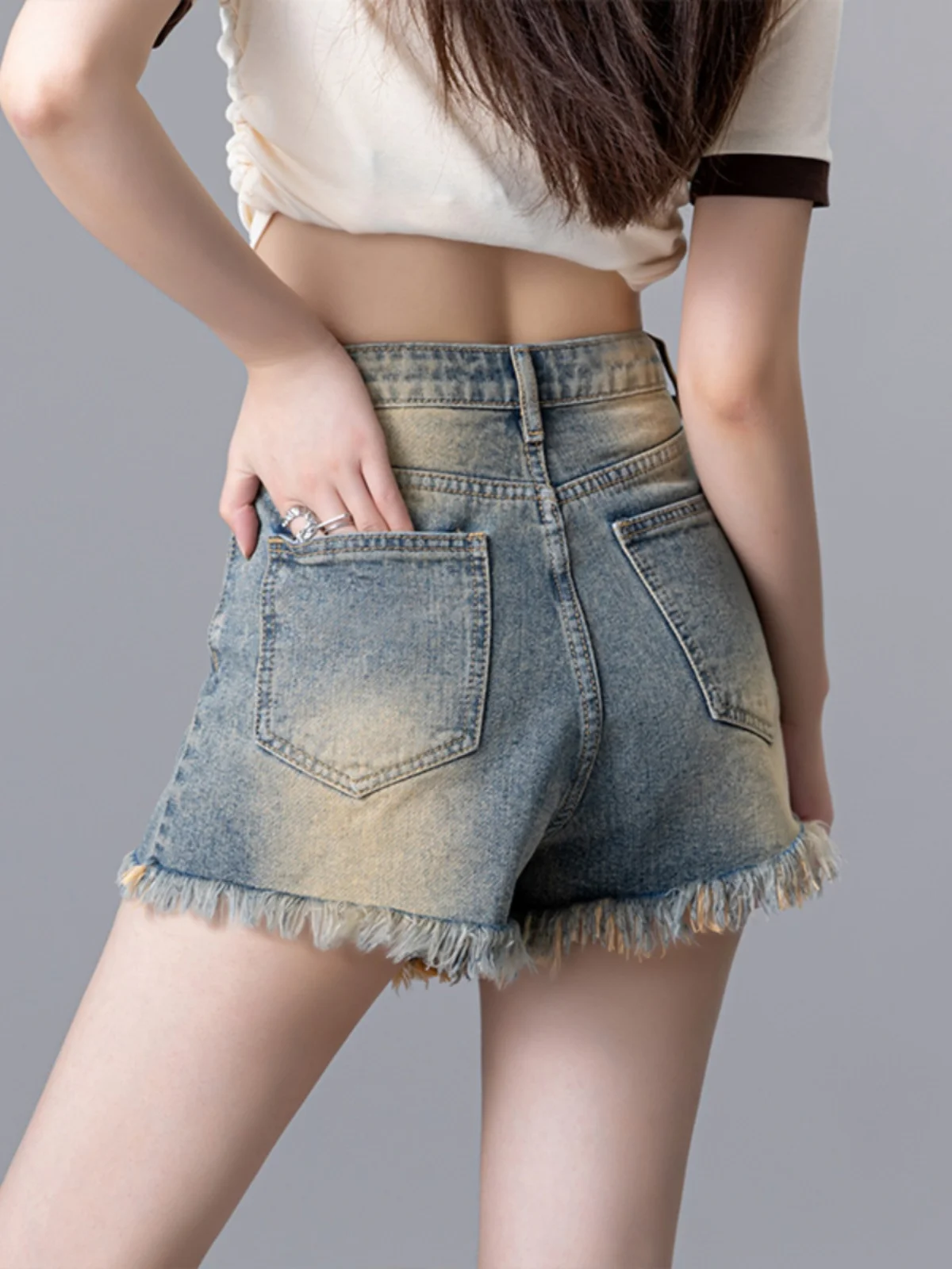 

Ретро джинсовые шорты с высокой талией и рваными краями для женщин, летние, новые, больших размеров, А-силуэт, сексуальные, модные, универсальные