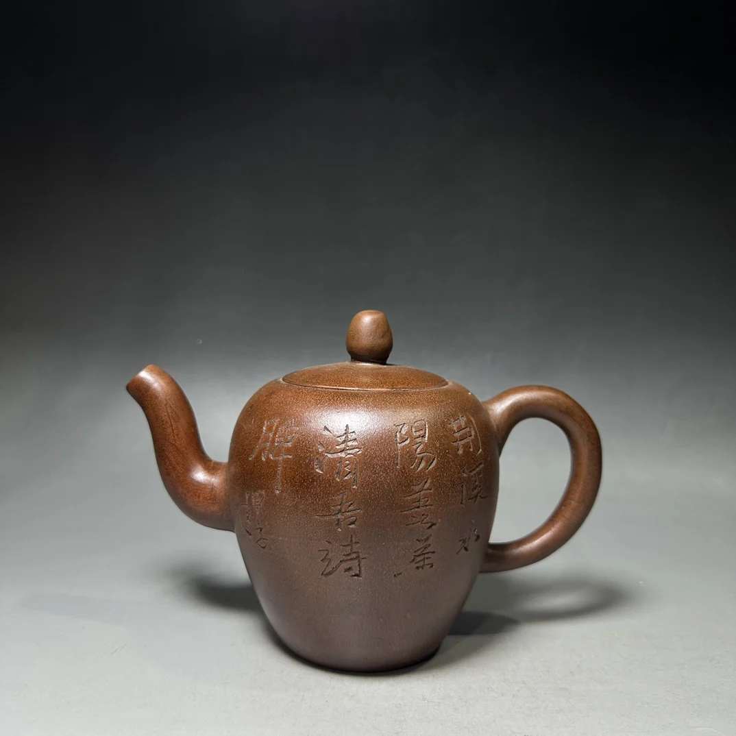 The Classic Purple Clay Teapot is Finely Crafted and Exquisitely Shaped Making it a Home Craft Worth Decorating and Collecting