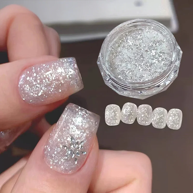 

1 коробка ультратонких, нежных, блестящих, сверкающих, ультраярких, мерцающих, модных украшений для ногтей с эффектом снежинок, бело-серебристые