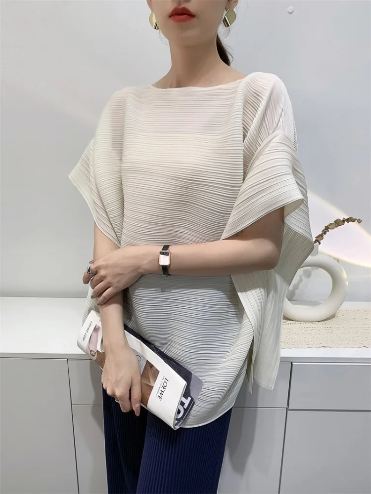 

Japanese Sle ort Sve Pleated T-irt Women Summer New Loose Irregular Belly Covering Slimming Pleat Top Commute Sle