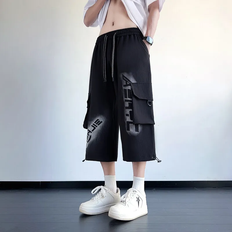 Pantaloni capri casual da uomo estivi streetwear 3/4 pantaloncini con coulisse sport all'aria aperta pantaloni corti larghi pantaloni in vita elastica per giovani