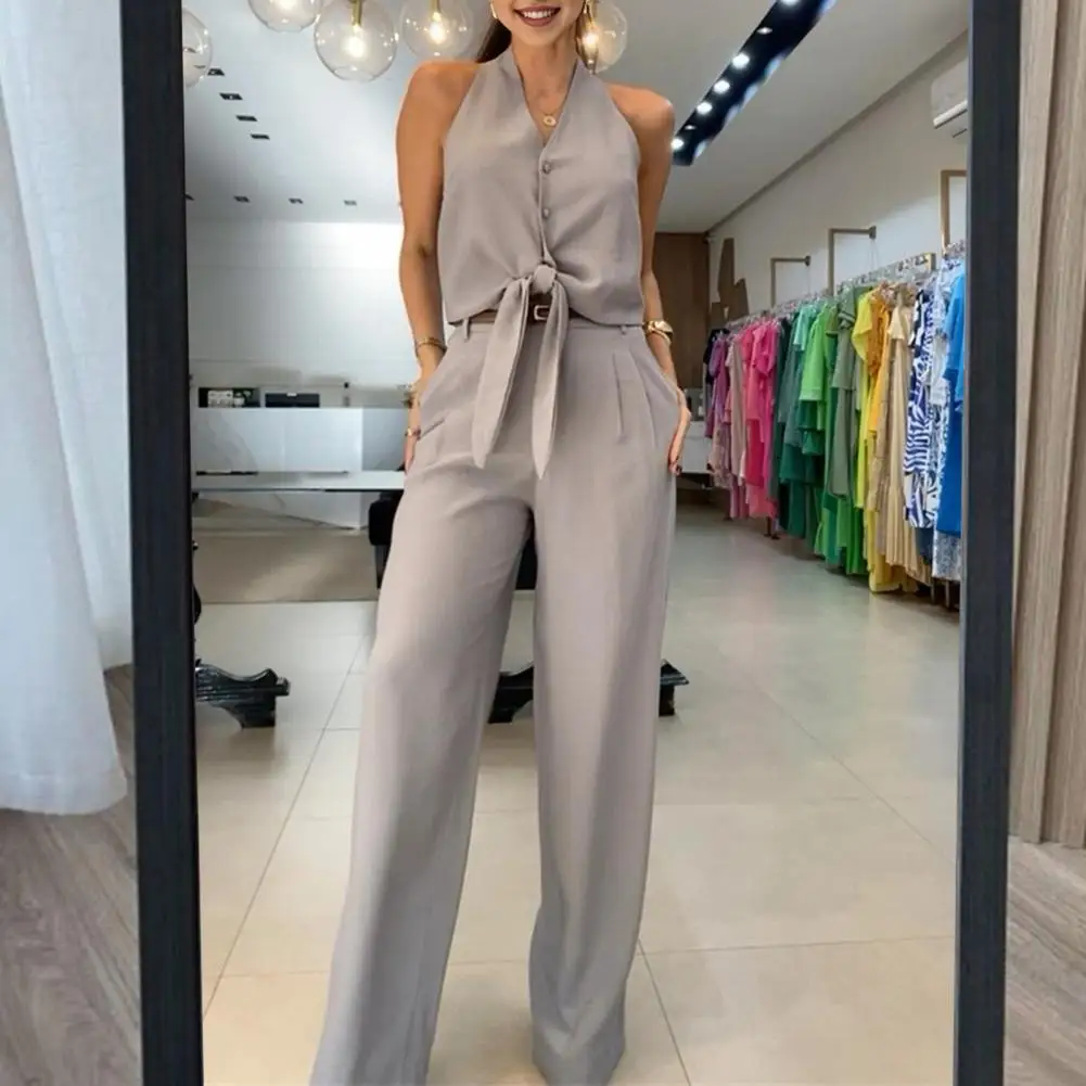 

Элегантный женский деловой костюм с топом и завязкой на подоле, однотонный жилет без рукавов и широкие брюки, профессиональный офисный костюм