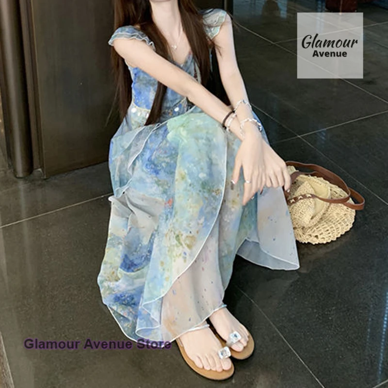 

French small fresh seaside holiday style printing small flying sleeve suspender dress female summer new waist fairy long skirt