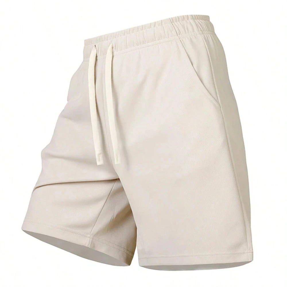 

Men's solid color casual sports shorts with elastic waistband and drawstring design suitable for lounging at home or sleeping