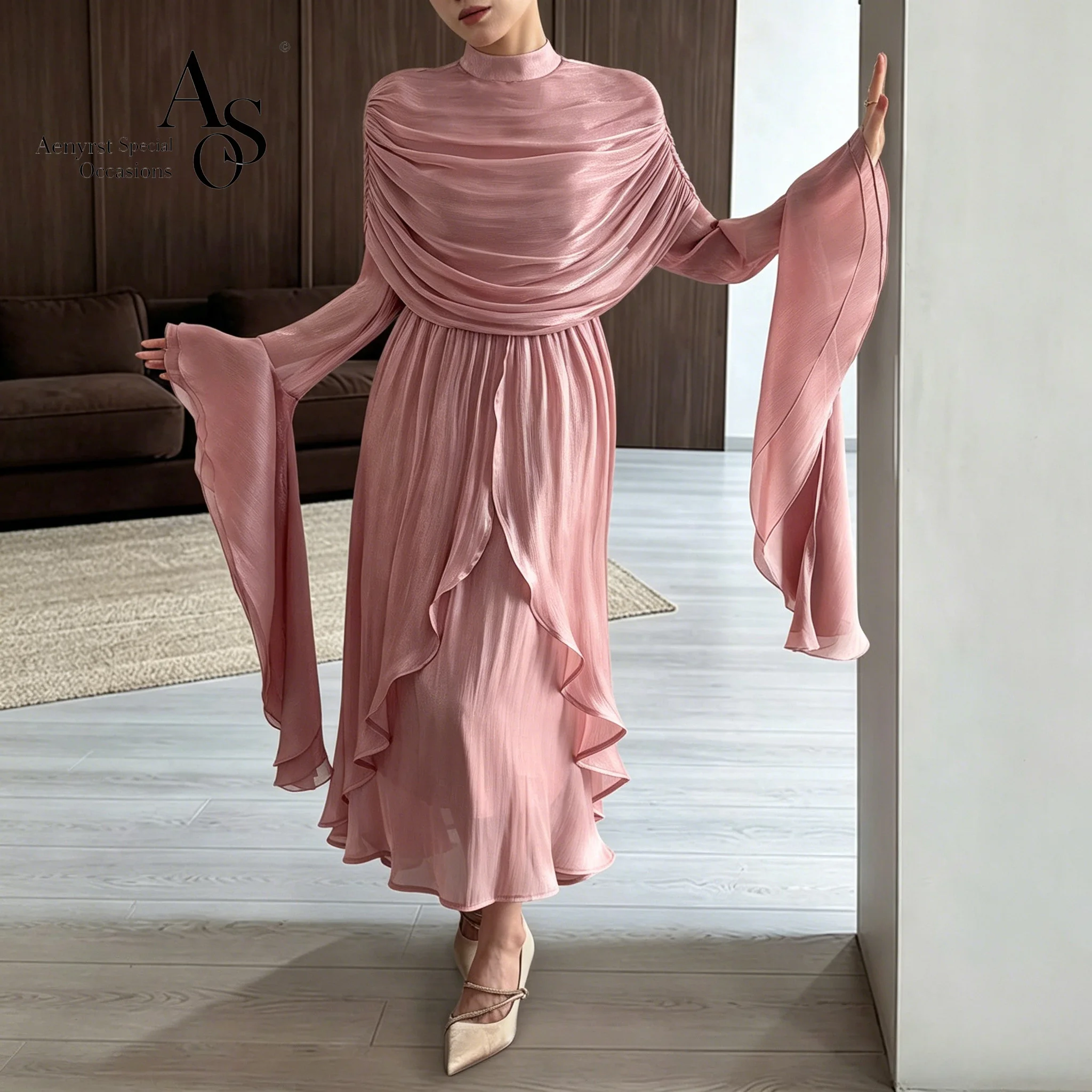 Pink high-neck flared-sleeve maxi dress with draping and a matching cropped jacket suitable for formal occasions and balls