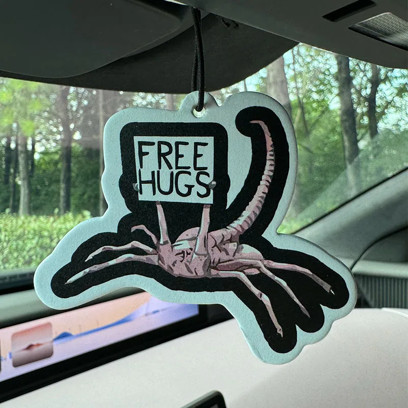 Funny Free Hugs Hilton (Hotel Scent) Car Air Freshener |   Rearview Mirror Hanger & Dual-Purpose Air Vent Clip |   Natural Material Aromatherapy Tablets |   Long-Lasting Fragrance for 90 Days |   Alcohol-Free |   Not Afraid of Direct Exposure to the Sun |   Designed Specifically for Odor Removal in Cars, Closets, and Bathrooms. |   Cartoon Animation Graphics |   Unisex |   Luxury-Grade Fragrance |
