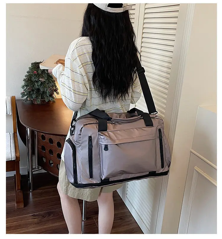 Expandable travel duffel bag with trolley sleeve, wet/dry separation, independent shoe compartment, sports and fitness bag