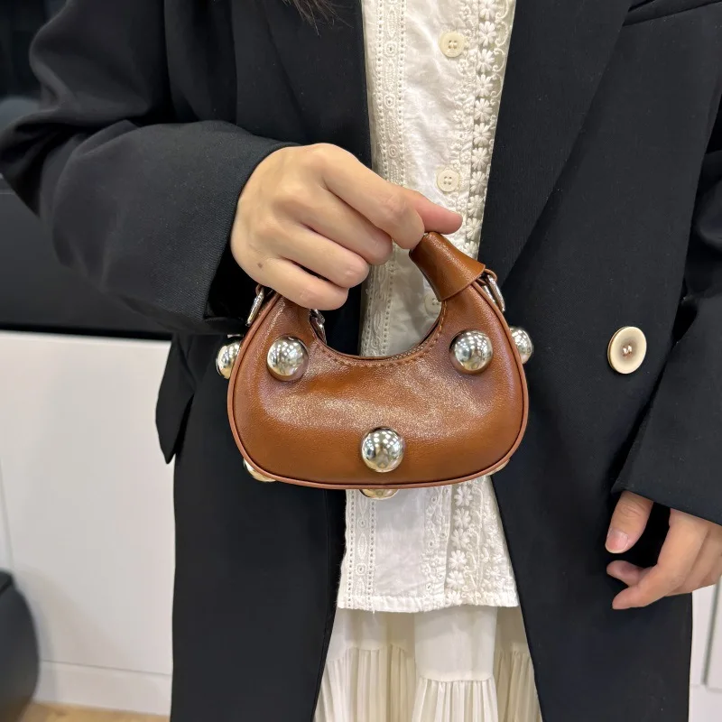 حقيبة بمقبض علوي لعام 2025، محفظة لوكس تحت الإبط للنساء، حقيبة كروس مدمجة، حقيبة أنيقة ليلاً ونهارًا، حقيبة حبال مزخرفة #1