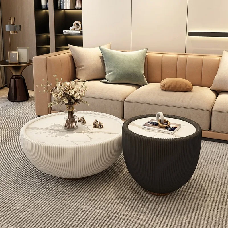 

Round rock slab coffee table combination, simple household light luxury coffee table in the living room