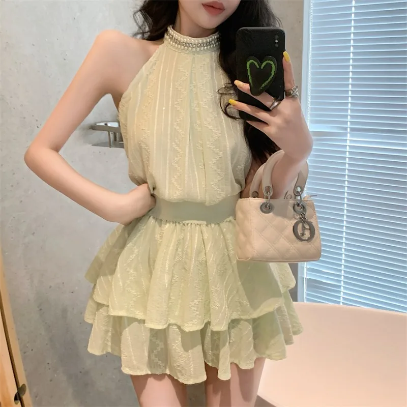 

Summer Sweet Hot Girl Suit Women Sleeveless Halter Neck Peals Beading Chiffon Shirt Tops + Ruffles Mini Cake Skirt Two-piece Set