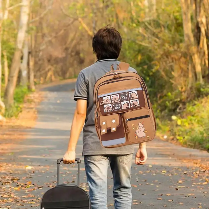 Kapibara กระเป๋าเป้สะพายหลังนักเรียนชั้นประถมศึกษาการ์ตูนความจุขนาดใหญ่กระเป๋าเป้สะพายหลังป้องกันสกปรก Capybara กระเป๋าเป้สะพายหลัง