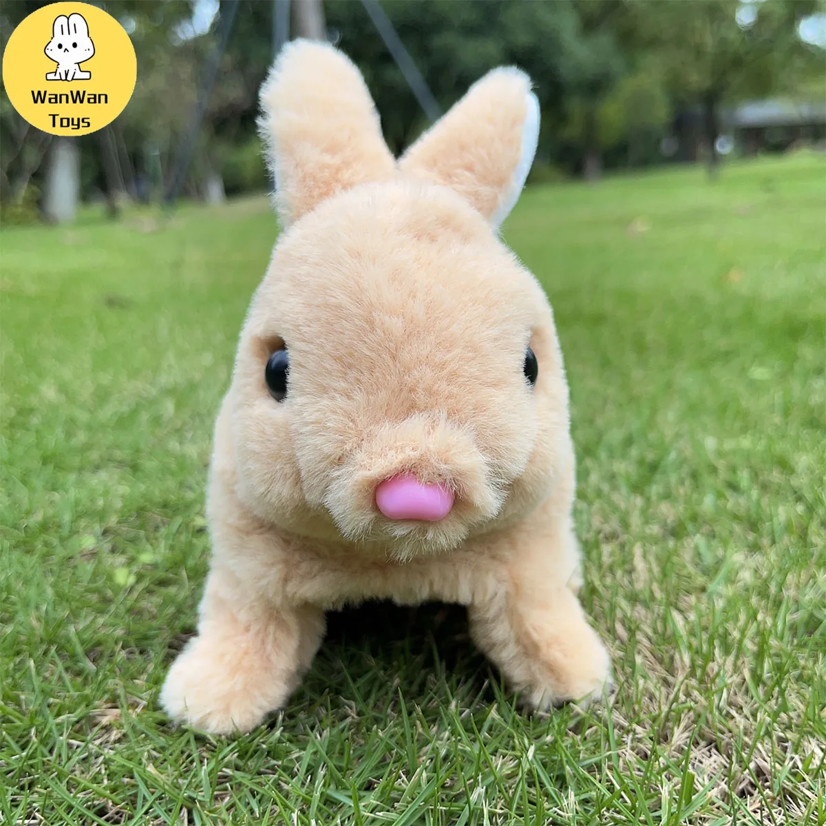 Piccolo giocattolo elettrico in peluche a pelo piatto per bambini con coniglio a pelo lungo in tinta unita dagli occhi neri