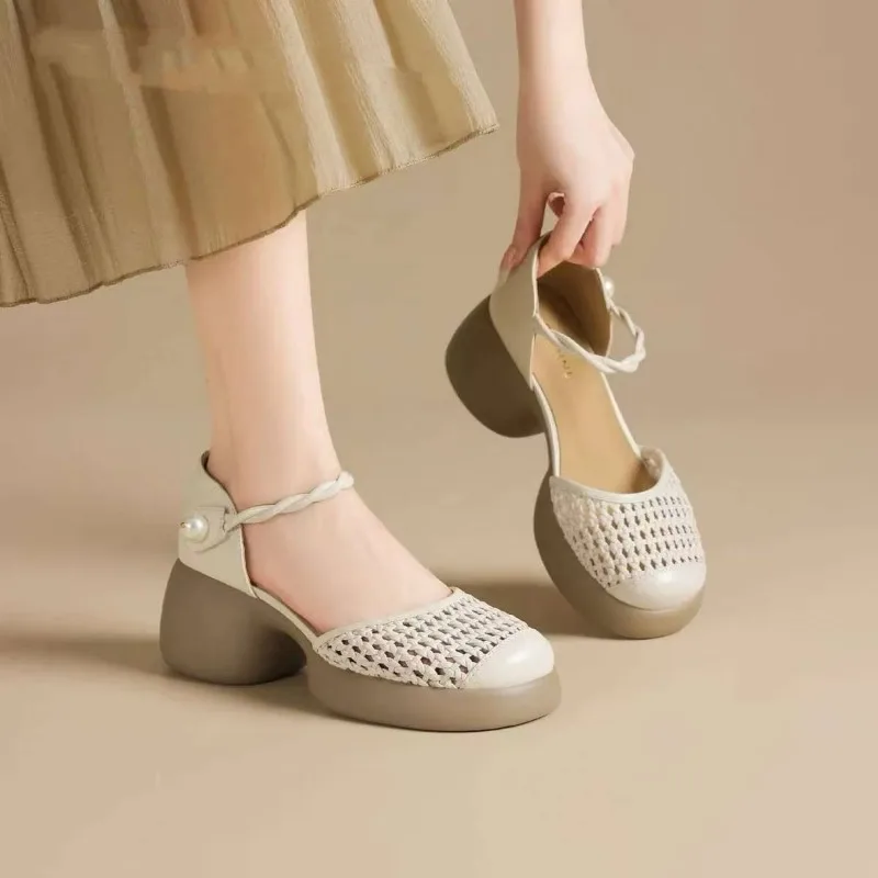 

Round Toe Woven Hollow-out Baotou Sandals Women's 2026 New Simple Block Heel Shoes