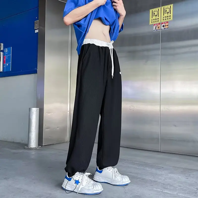 

Ice silk pants for men, summer thin style, trendy ankle tied sports pants, loose and wide legs, hanging and casual pants