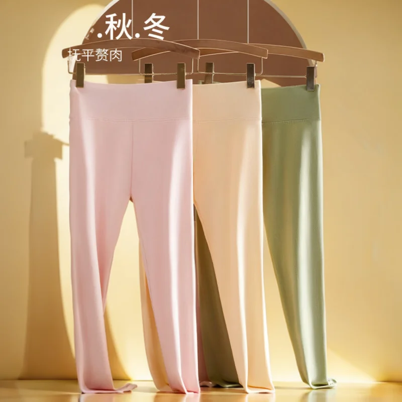 طماق امرأة فضفاضة Bootcut الحرارية متقلب ماتي الخامس قطع جميلة الرجل Jeggings متعرج الكتابة على الجدران منقوشة تصميم خمر الفلورسنت