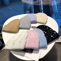 New bow pearl small fragrant wind woolen hat for children autumn and winter warm bun head cold knit cold hat