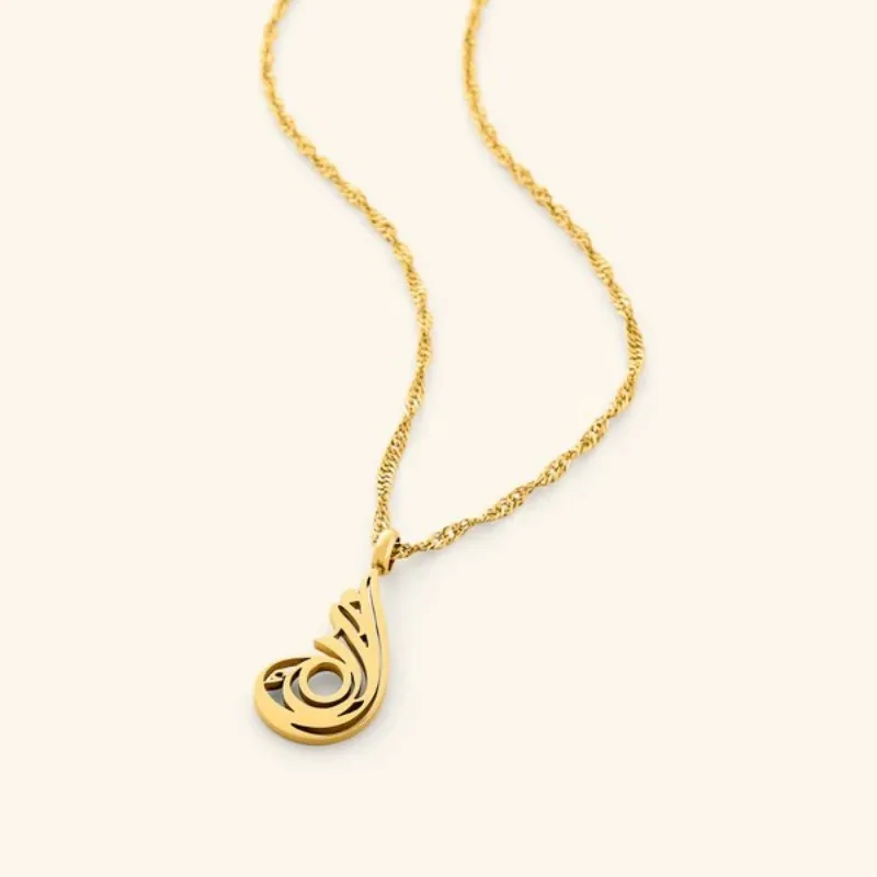 

Necklaces The Arabic calligraphy for "serenity" mirrors the soft flow of inner calm, shaped to reflect purity and presence