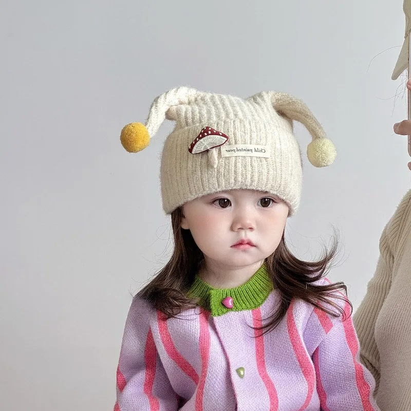 Cute antenna kids' hat for autumn and winter, thickened knitted wool with ear flaps, windproof warm, suitable for baby .