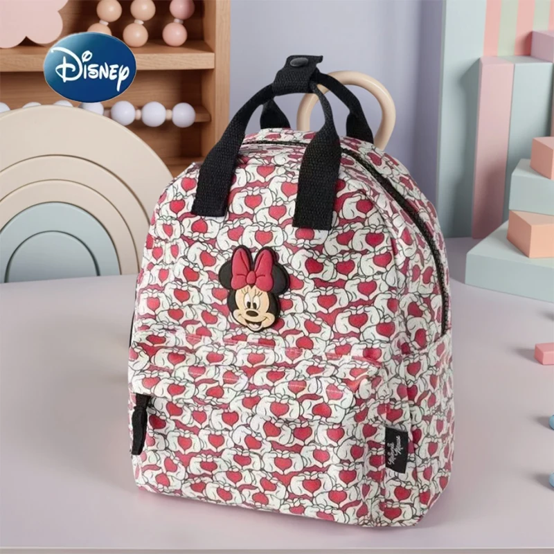 

Disney 2025 New Cute Minnie Children's Backpack Girls Cartoon Print Large Capacity Book Storage Kindergarten Baby School Bag