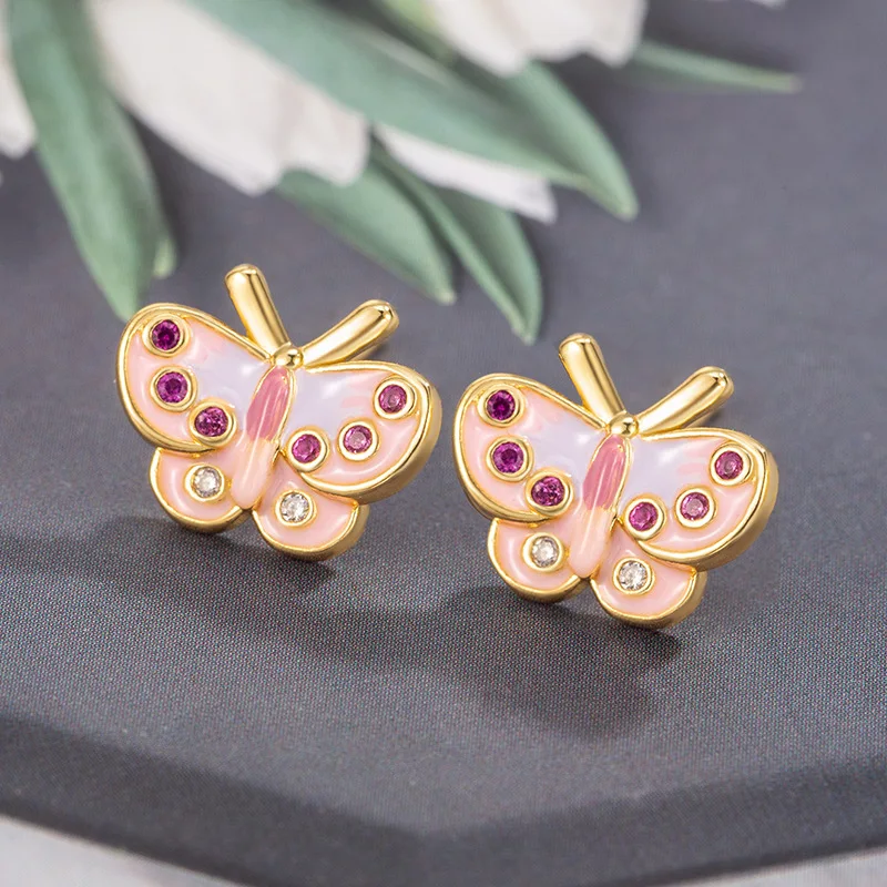 

The 925 sterling silver cute pink butterfly stud earrings are 14K gold-plated earrings for ladies and women, wedding party jewel