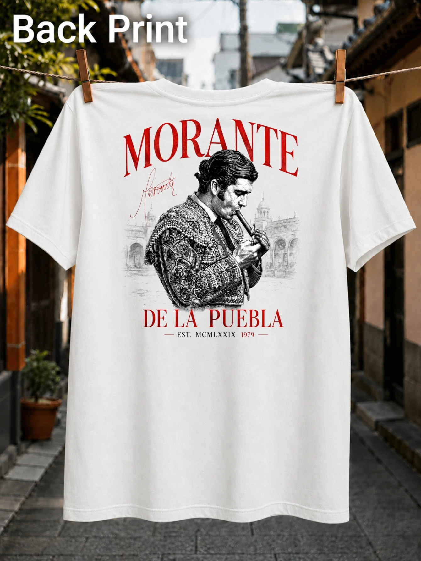 Morante De La Puebla with grayscale matador lighting cigar red serif name signature est MCMLXXIX  Unisex All T-Shirt