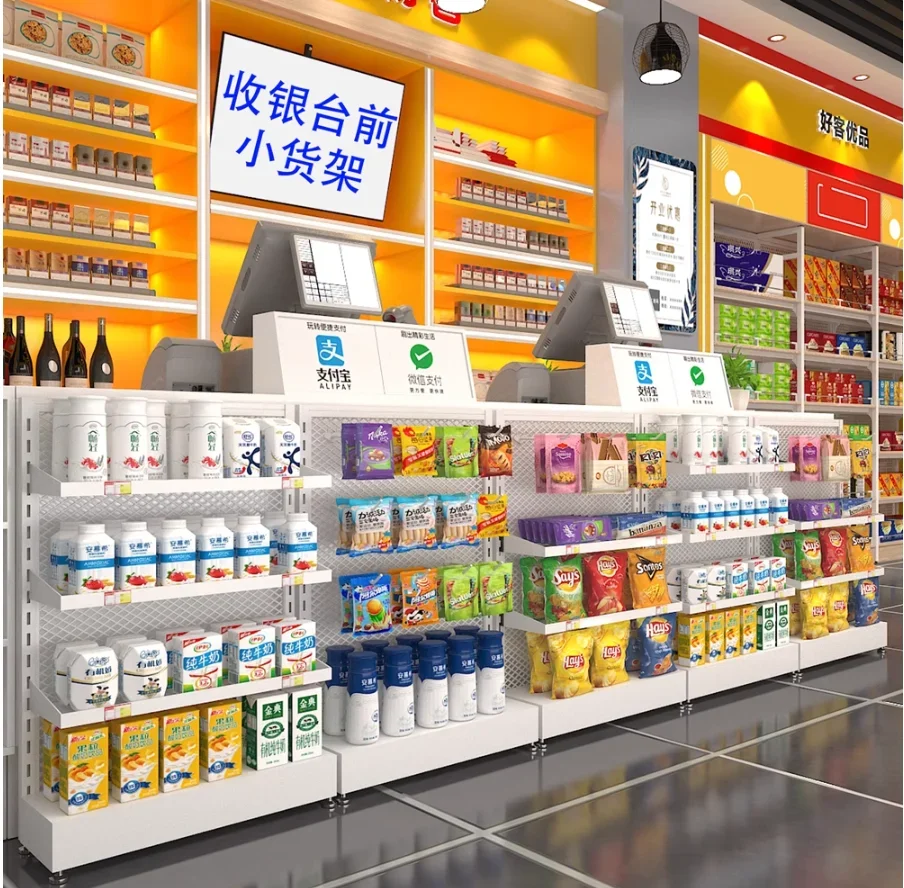 Supermarket cash register in front of the shelf gum snacks hanging drugstore promotional display