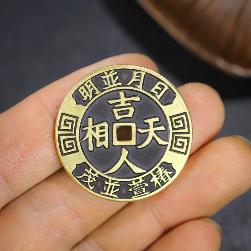 Antique coins from the Qing Dynasty, depicting auspicious figures celestial symbols, are collectible art pieces and decorati