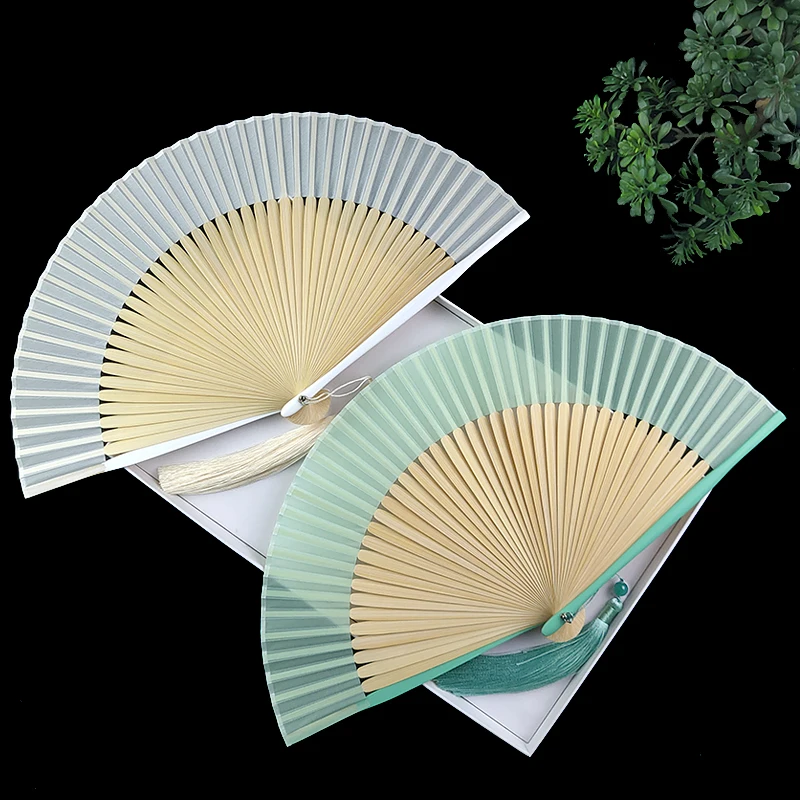 The product can be customized. Fan folding fan Chinese style plain silk fan solid color summer portable folding ladies and