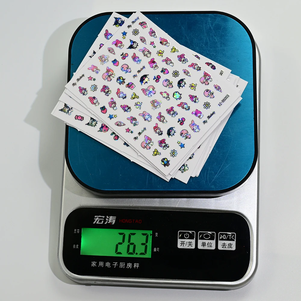 12 個レーザー漫画ハローキティクロミネイルアートステッカーメロディー自己粘着ネイルデカールかわいいアニメスライダーネイルアートデコレーション