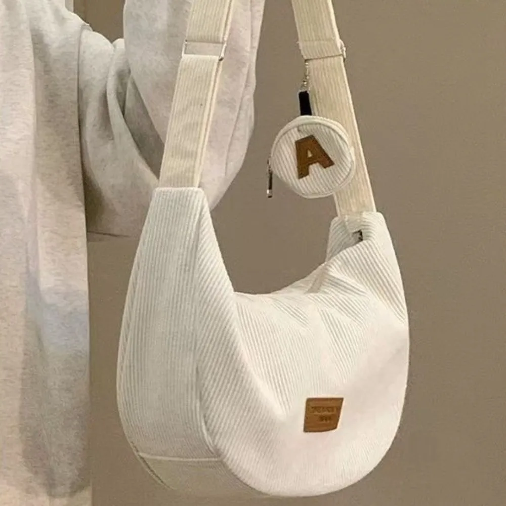 Borsa a tracolla da donna di grande capacità Borsa versatile per gnocchi Borsa a tracolla in velluto a coste Borsa per ascella per il tempo libero alla moda in tinta unita