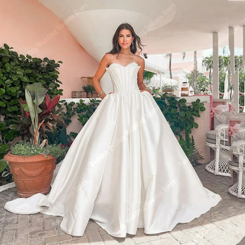 Lussuosi abiti da sposa da donna con superficie in raso abiti da ballo in tessuto lucido 2024 la più recente gonna soffice orli Princess Vestidos De Novias