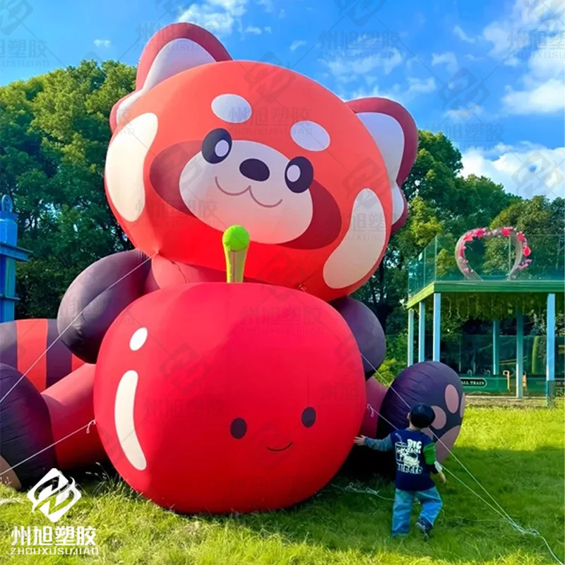 

Inflatable cartoon red panda holding apple air model animal mascot Grass mall outdoor activities decoration