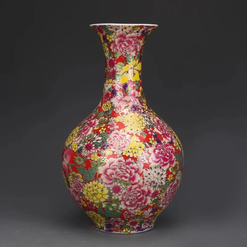 

Enamel - colored porcelain vase with a pattern of myriad flowers from the Qing Dynasty, an antique collection decorative item