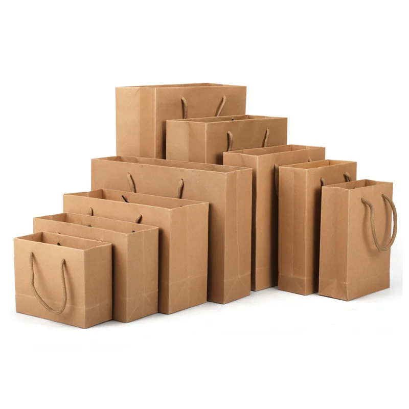 

100Pcs/Lot Vintage Original Kraft Paper Gift Bags with Handles Christmas Halloween Wedding Birthday Party Festive Candy Box Bags