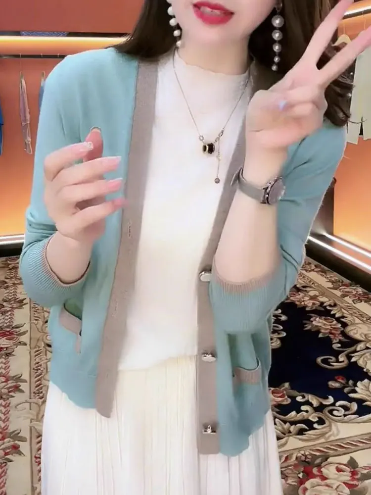 Faionable Color Blo tejido cárdigan abierto Casual suelto adelgazante prendas de vestir exteriores mujer otoño nuevo Sle Top viaje viento Sle